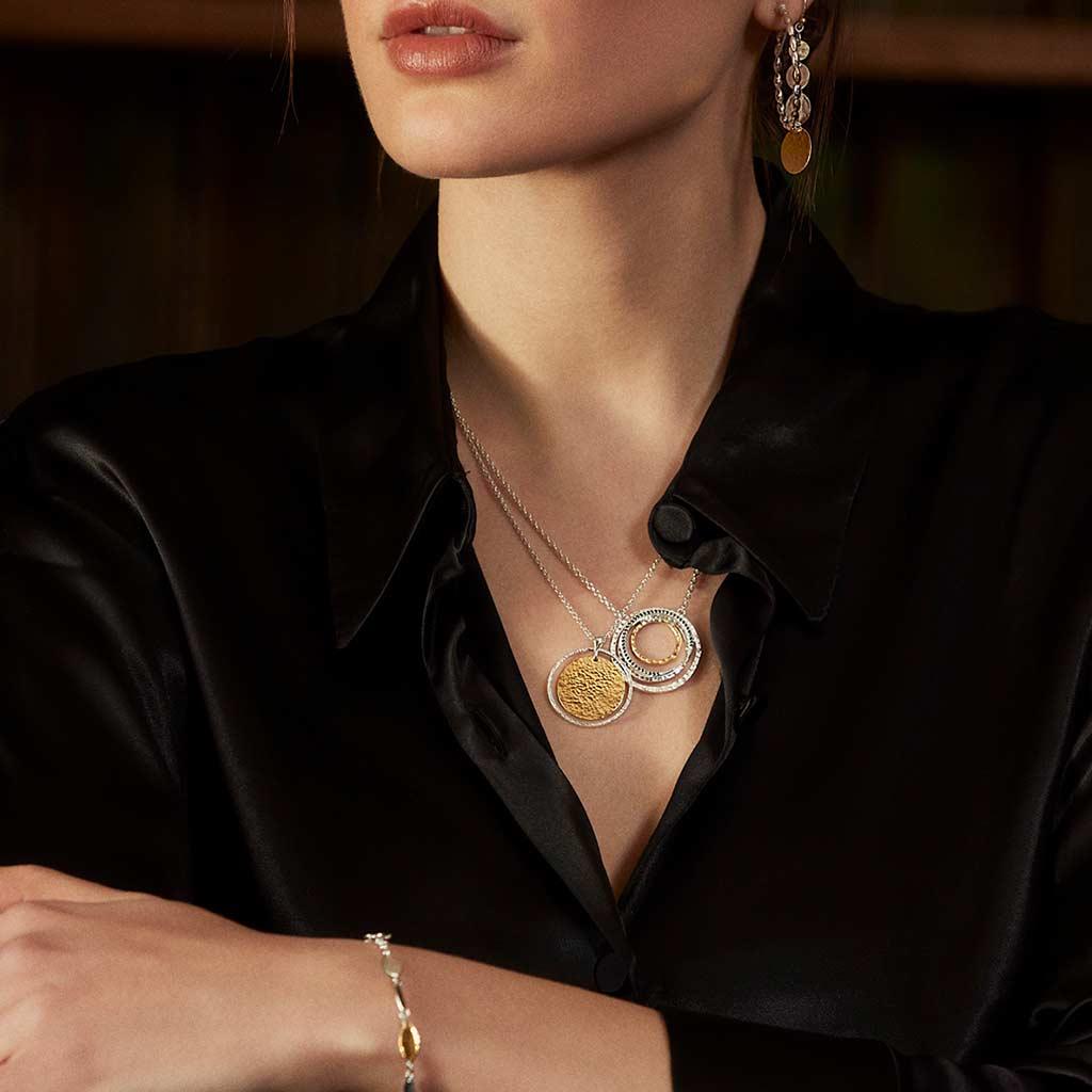 Gurhan pendant necklaces worn on neck at Victoria jones jewelry Amarillo