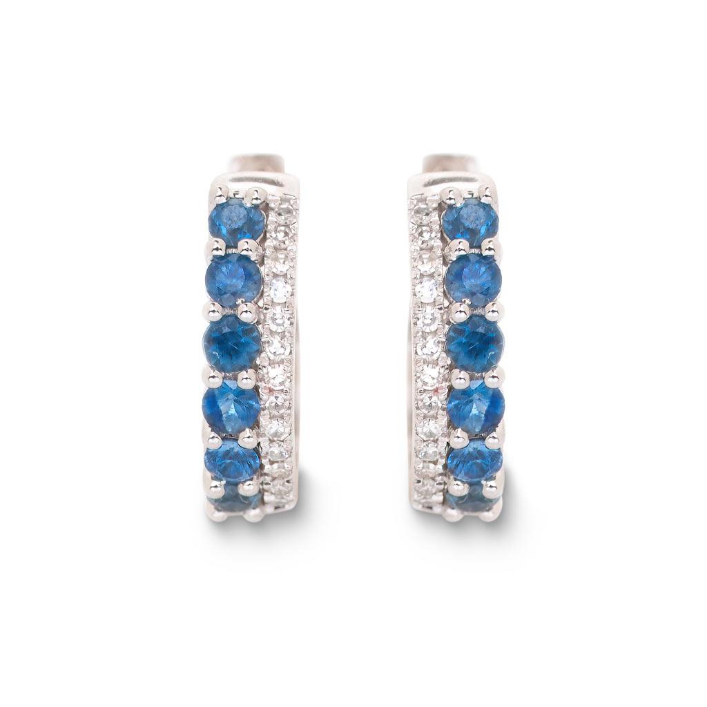 double row sapphire and diamond huggie earrings in white gold