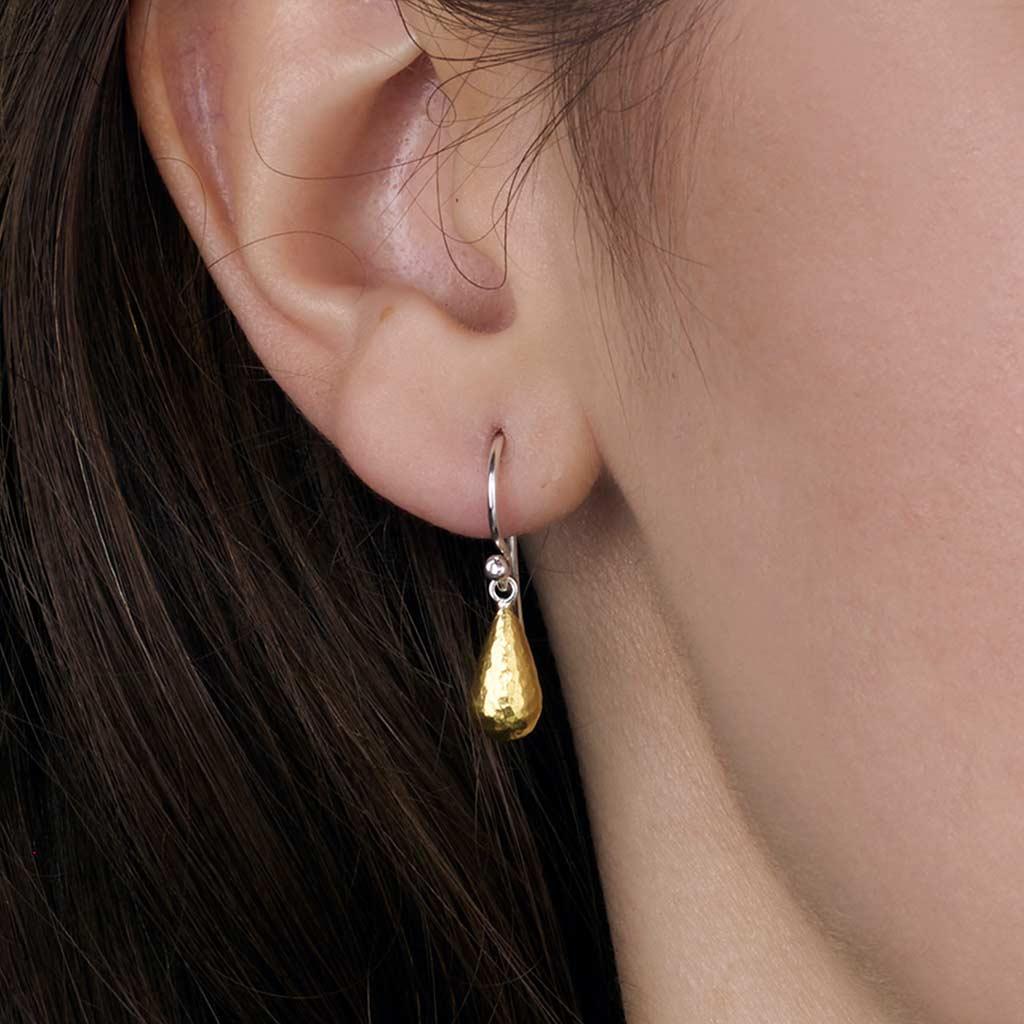 Gurhan Spell drop two-toned earrings worn on ear - Victoria Jones Jewelry Amarillo