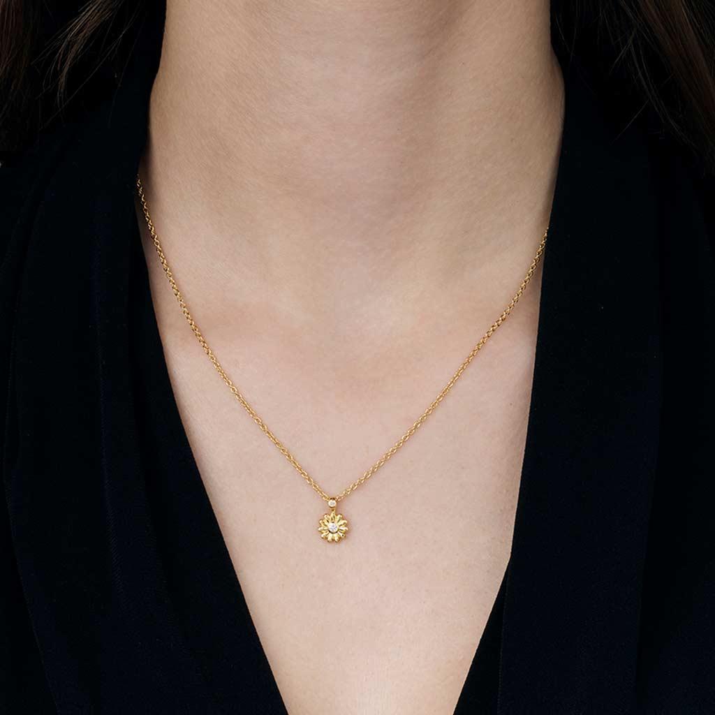 Gurhan Daisy flower diamond necklace in 24k yellow gold on neck