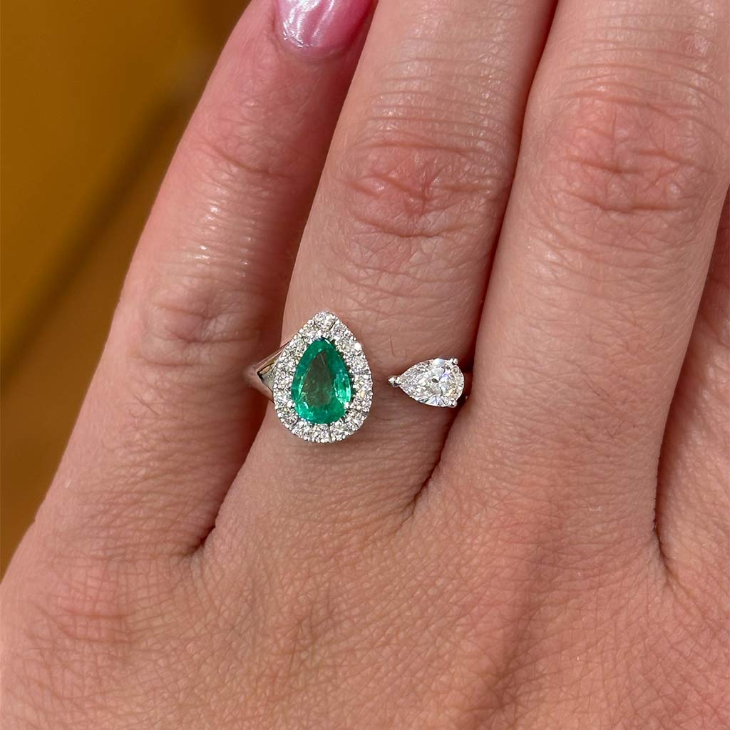 Piero Milano Emerald halo with pear diamond open ring located in Amarillo, tx Jewelry store