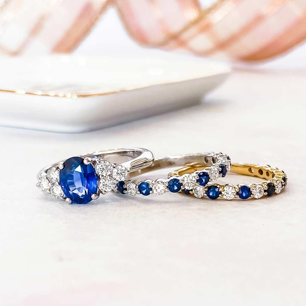 Blue sapphire and diamond ring with bands from Victoria Jones Jewelry Amarillo