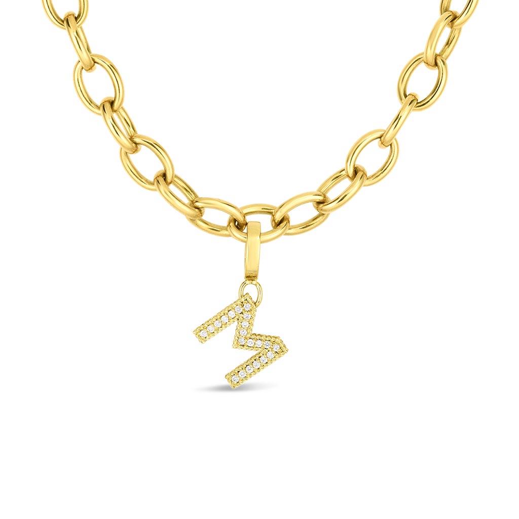 Roberto Coin tiny treasures M charm on a necklace in yellow gold