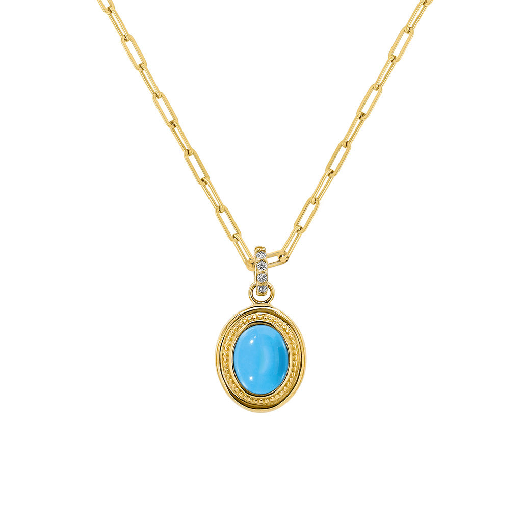 Gold paperclip necklace with a blue turquoise sleeping beauty pendant 