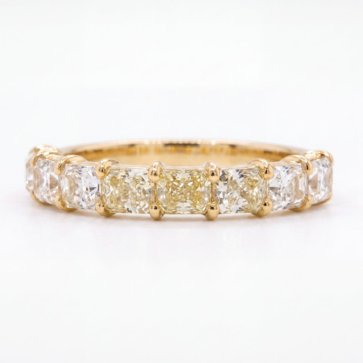 18K yellow gold radiant yellow diamond band ring featuring 8 radiant-cut diamonds totaling 1.61 carats