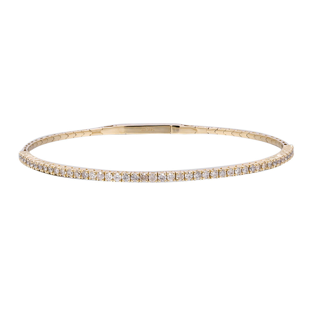 Flexible 1.0 CTW diamond bangle bracelet in yellow gold available at Victoria Jones Jewelry Amarillo TX