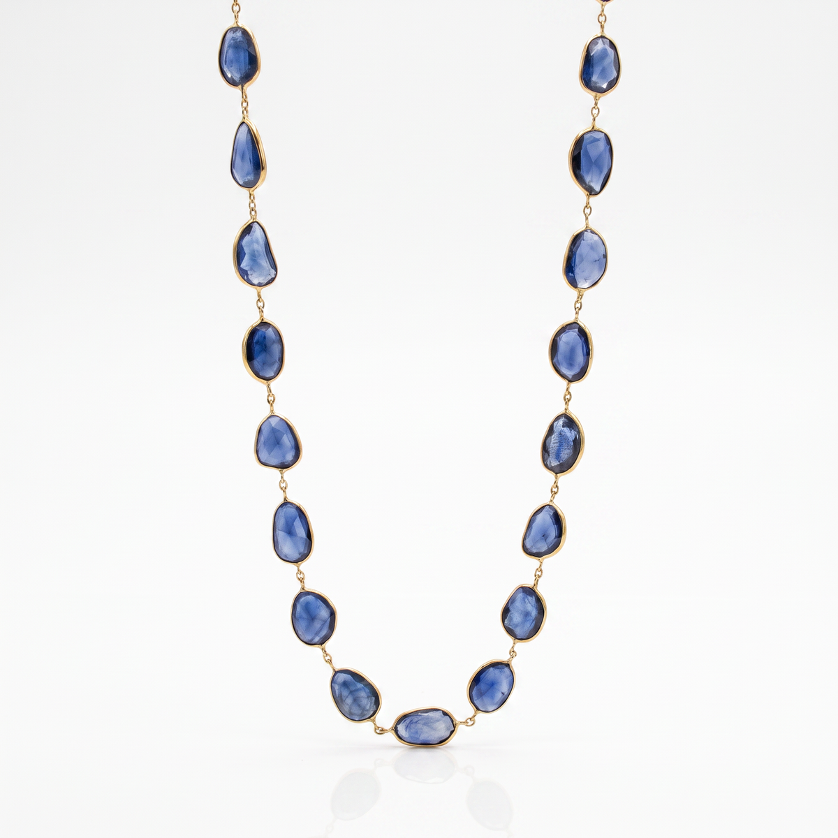 14K yellow gold blue sapphire slice necklace featuring 39 natural sapphire slices totaling 30.0 carats by Raymond Mazza.