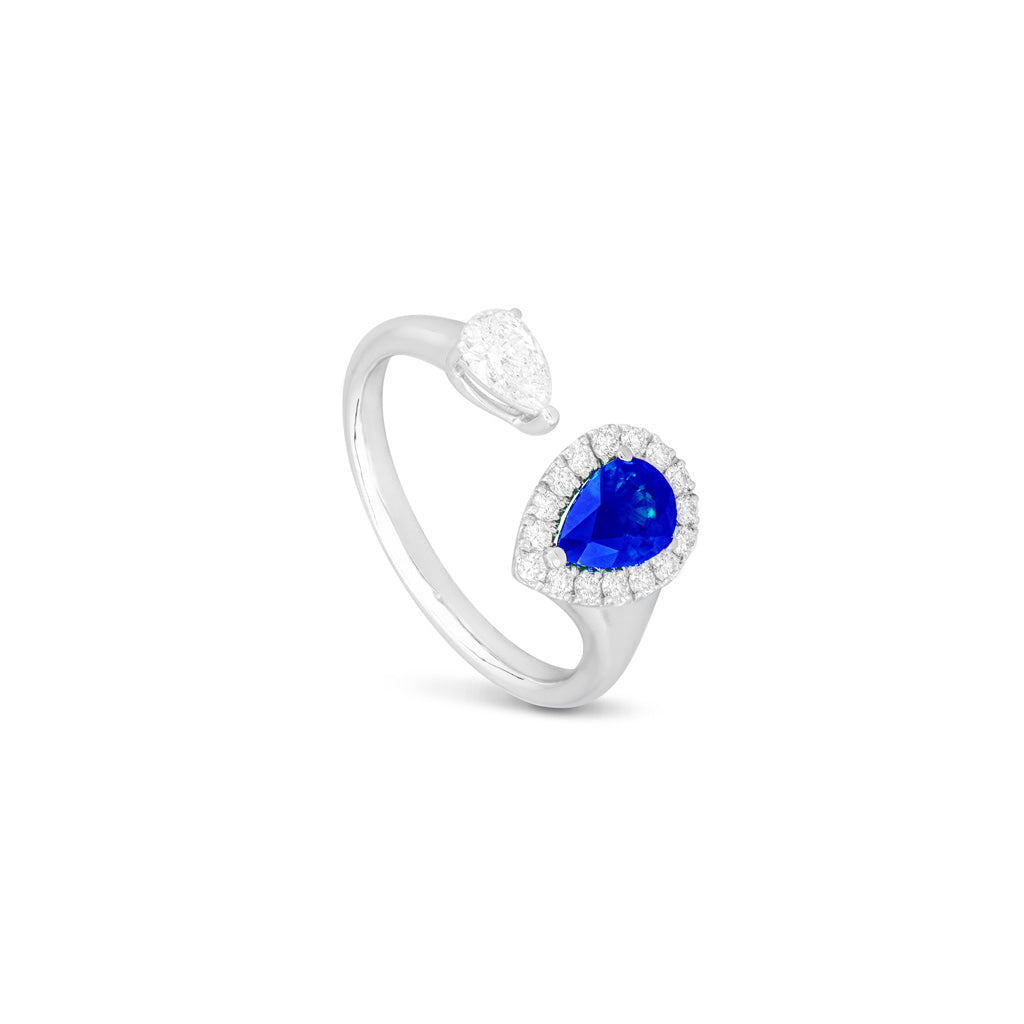 Blue sapphire and diamond halo open pear ring in white gold at Victoria Jones Jewelry