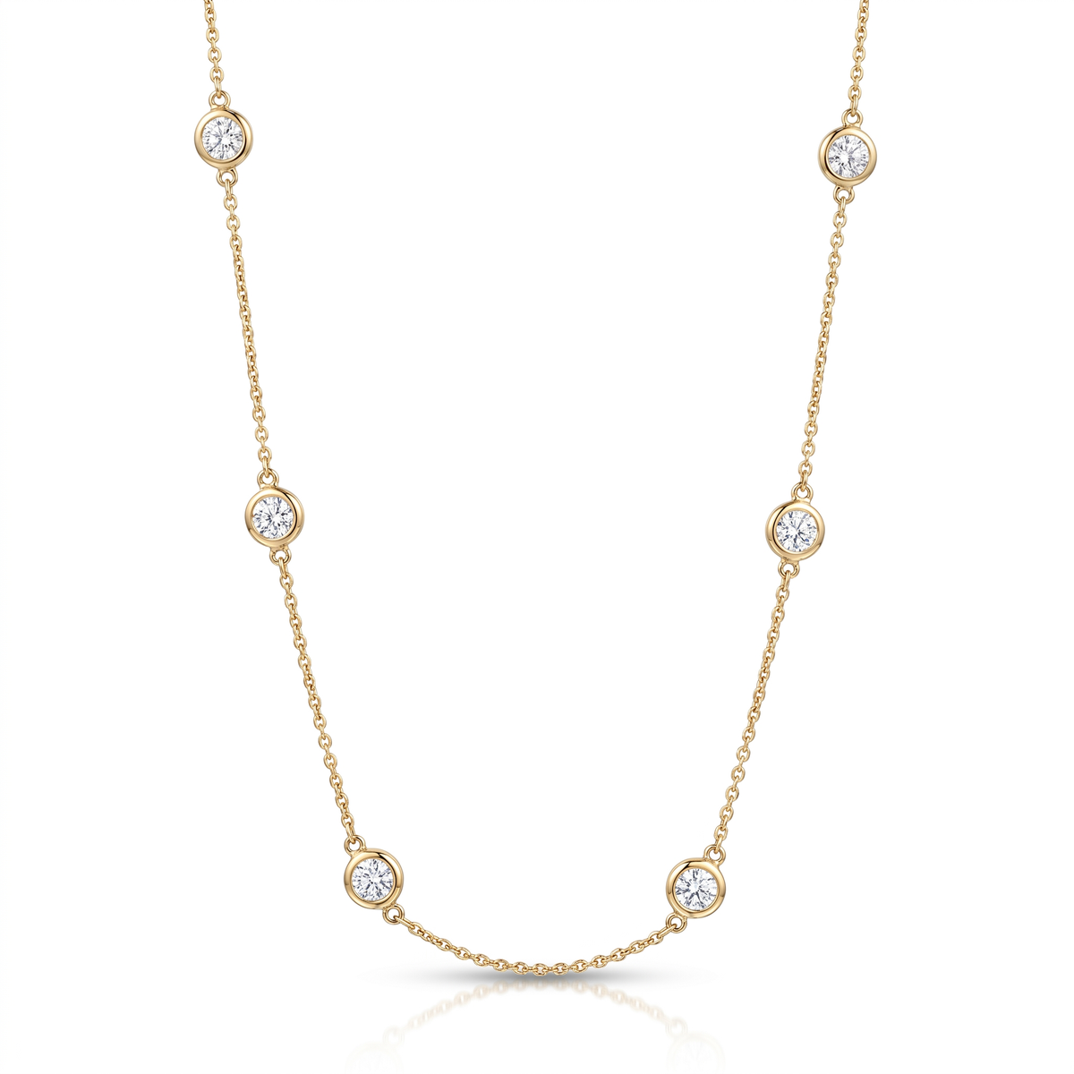 14K yellow gold Diamond by the Yard necklace featuring 12 bezel-set round diamonds totaling 4.77 carats on a 19-inch chain by Raymond Mazza.