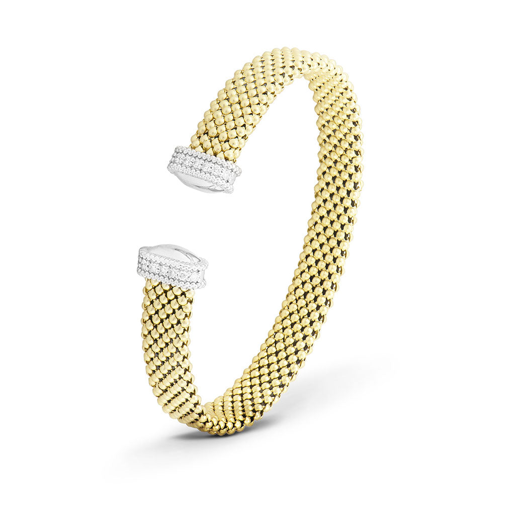 18K white and yellow gold woven cuff bracelet with diamond end caps and flexible design