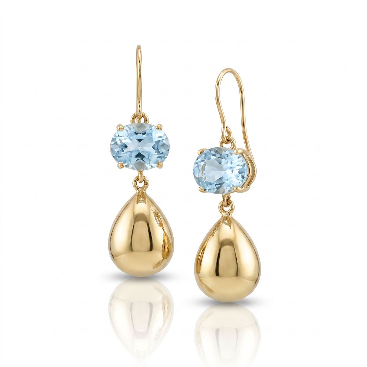 Raymond Mazza oval blue topaz drop earrings in 14K yellow gold with polished gold dangles.
