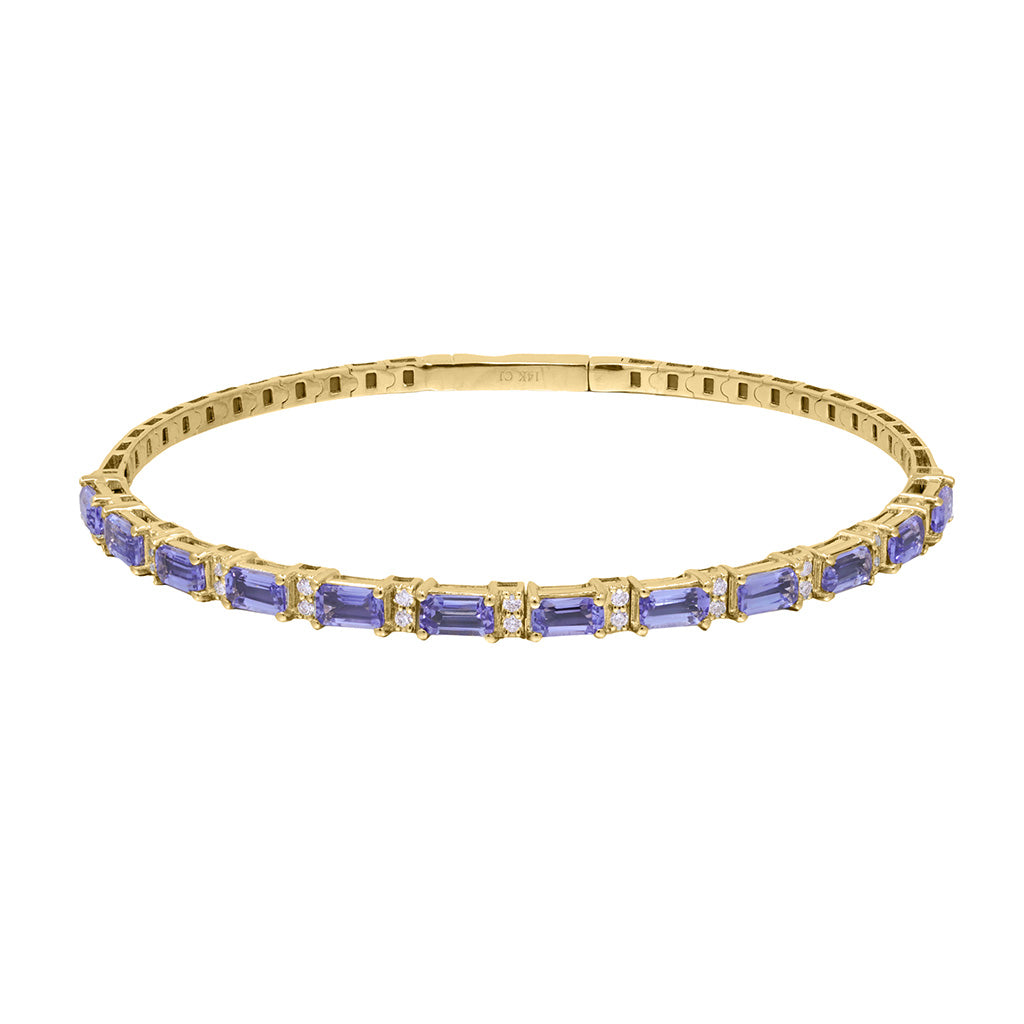 Tanzanite and diamond bracelet in yellow gold with alternating emerald cut purple gemstones and diamond details