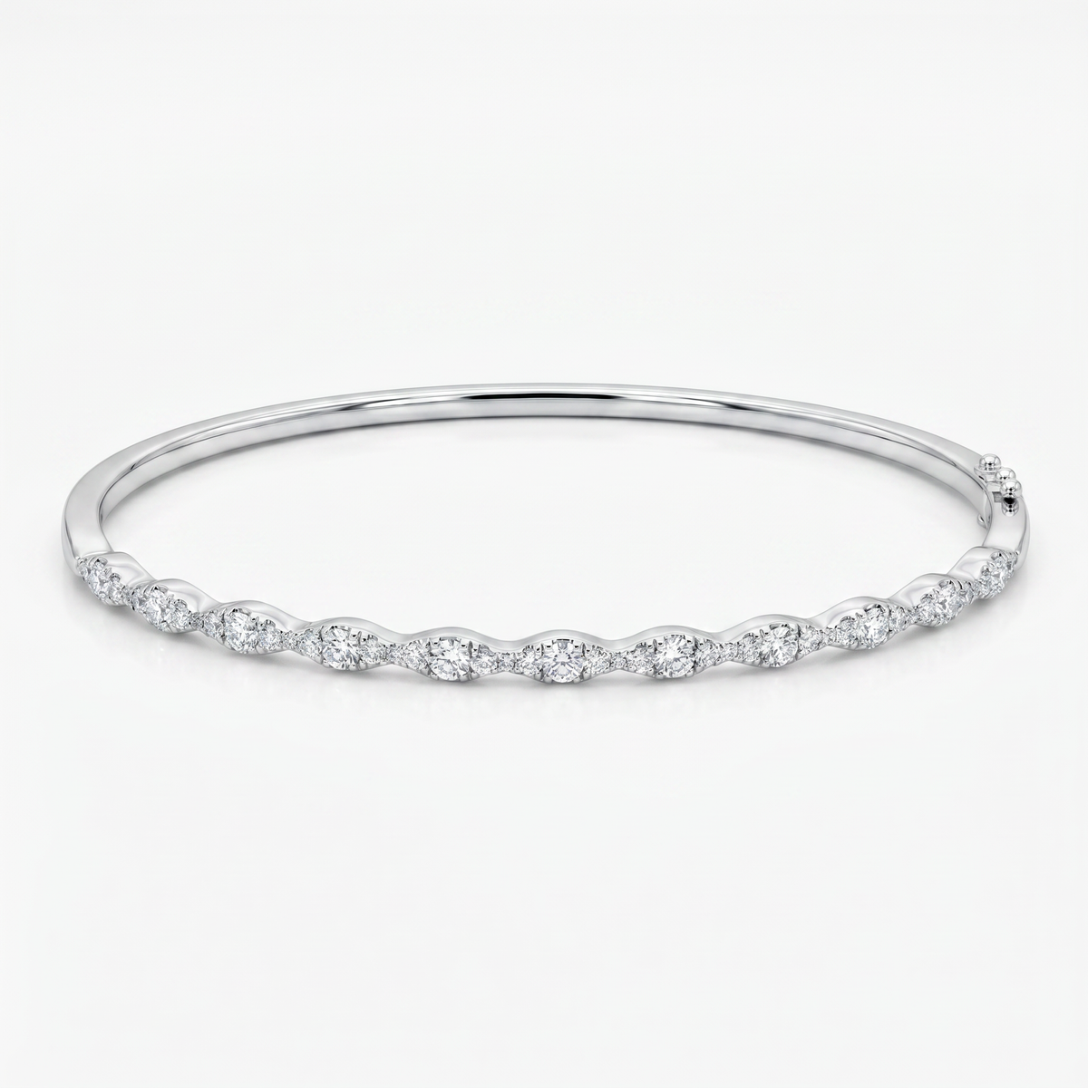 18K white gold graduated diamond bangle available at Victoria Jones Jewelry Amarillo Texas