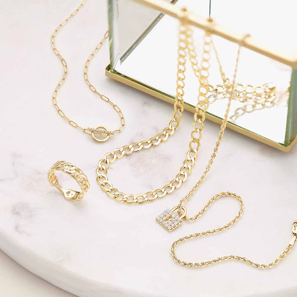 gold link necklace and link ring