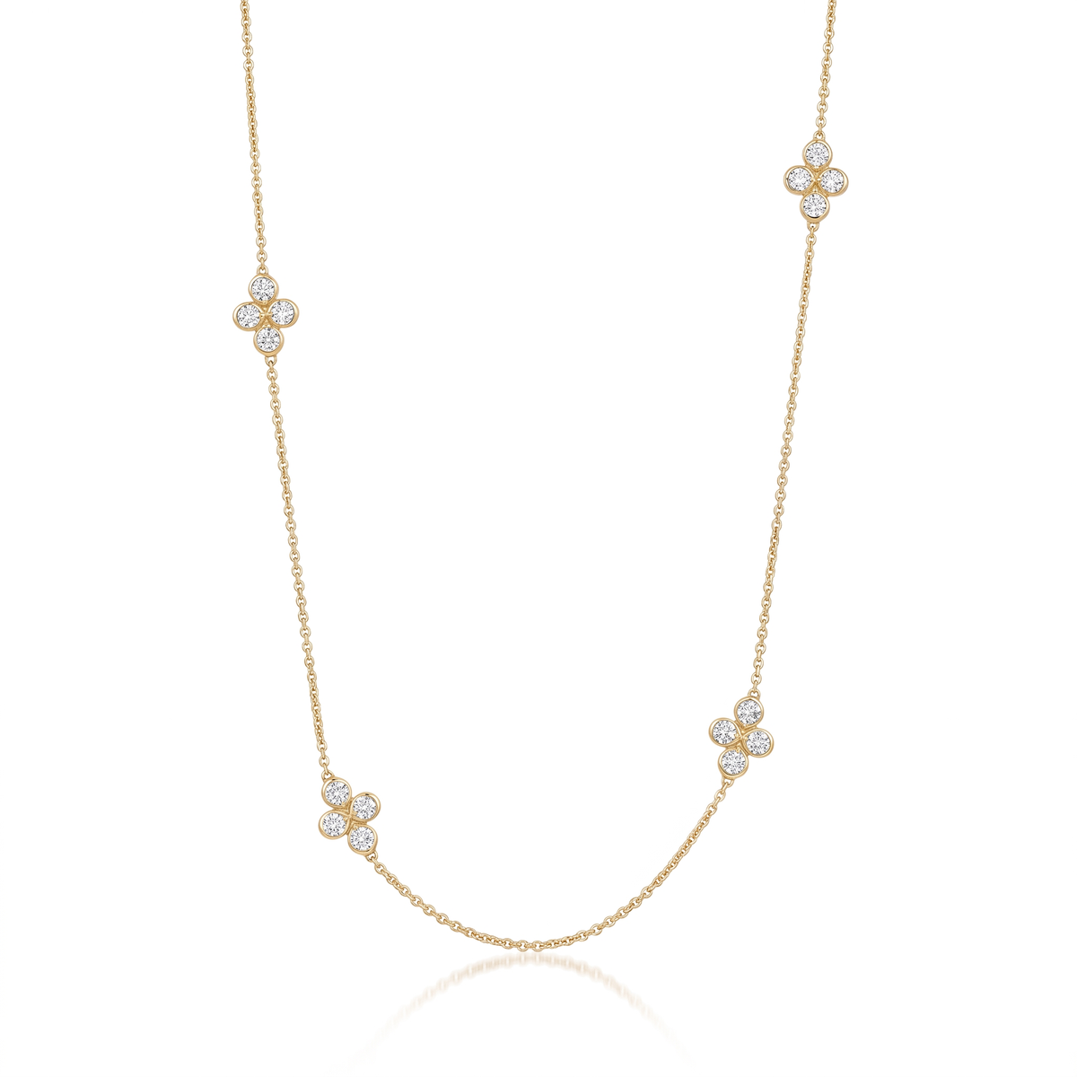 14K yellow gold diamond clover station necklace featuring seven clover-shaped diamond stations by Raymond Mazza.