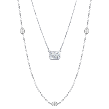 oval diamond by the yard necklace and radiant bezel pendant