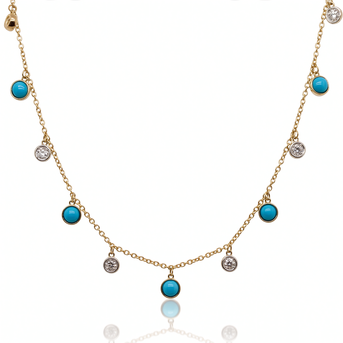 14K yellow gold turquoise and diamond dangle station necklace with round turquoise and diamond accents.