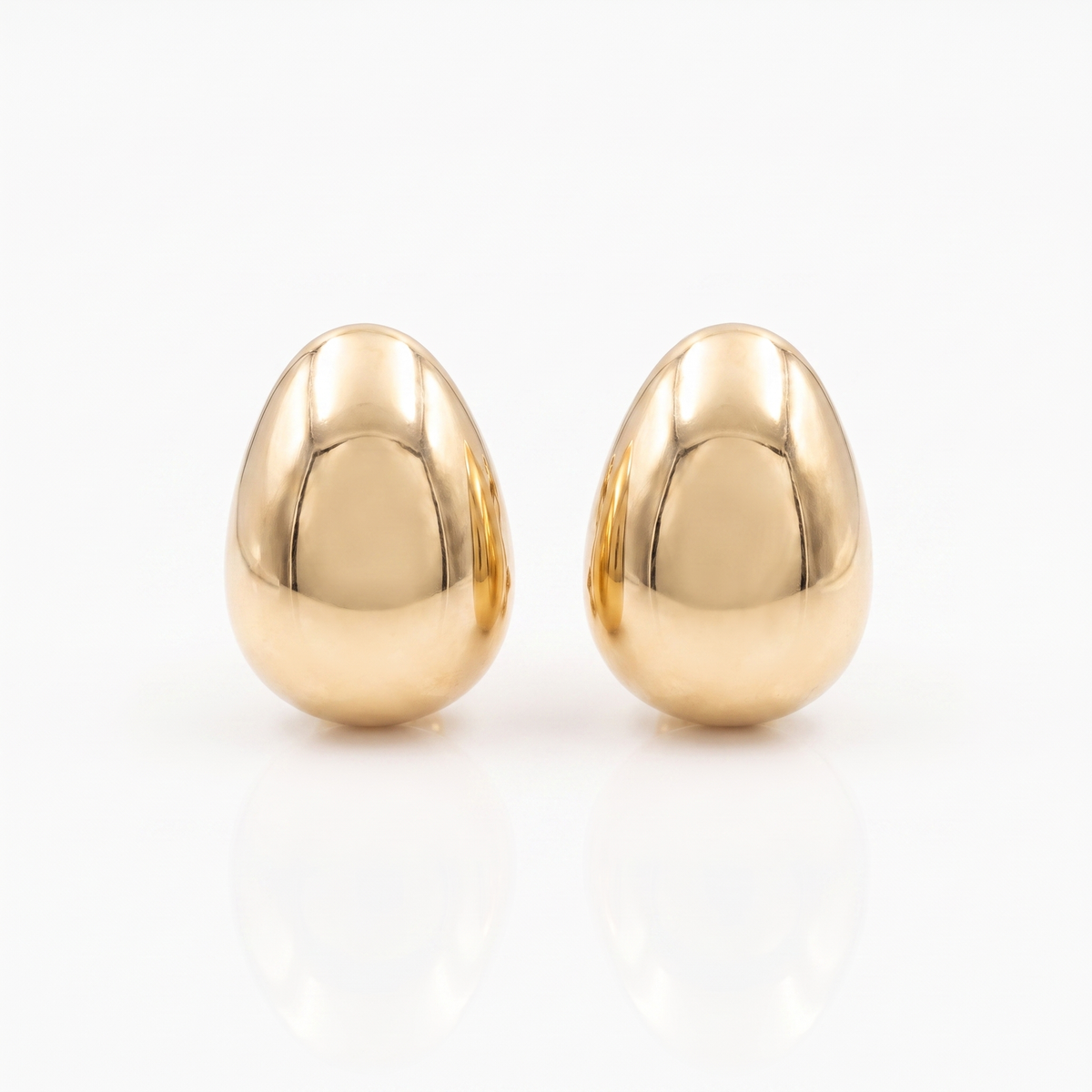 14K yellow gold polished dome stud earrings with pushback closures by Raymond Mazza.