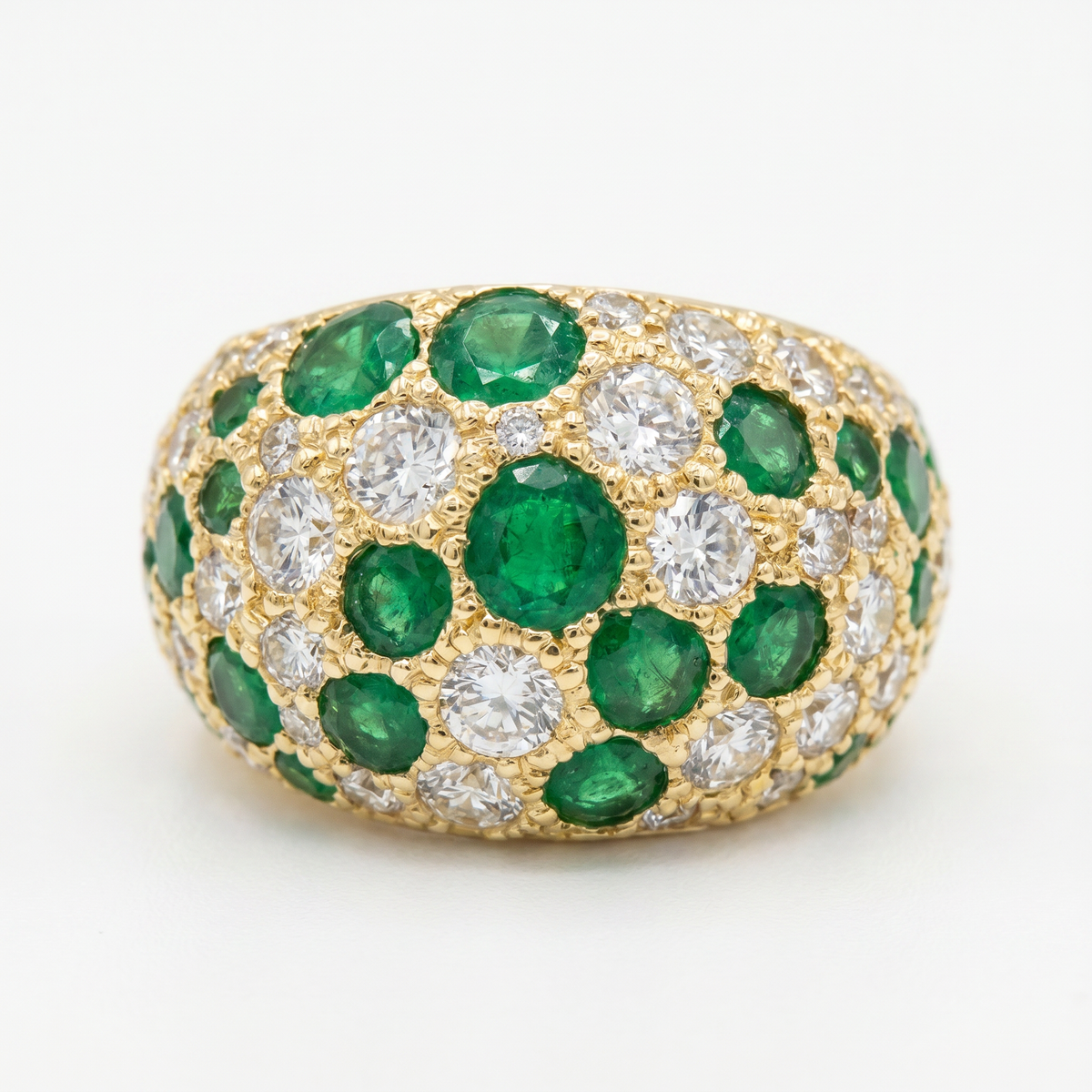 14K yellow gold wide emerald and diamond band ring with bezel-set gemstones and milgrain detailing