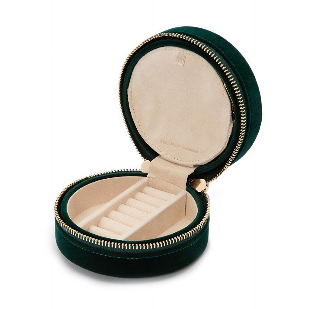 Velvet green jewelry travel round with cream interior
