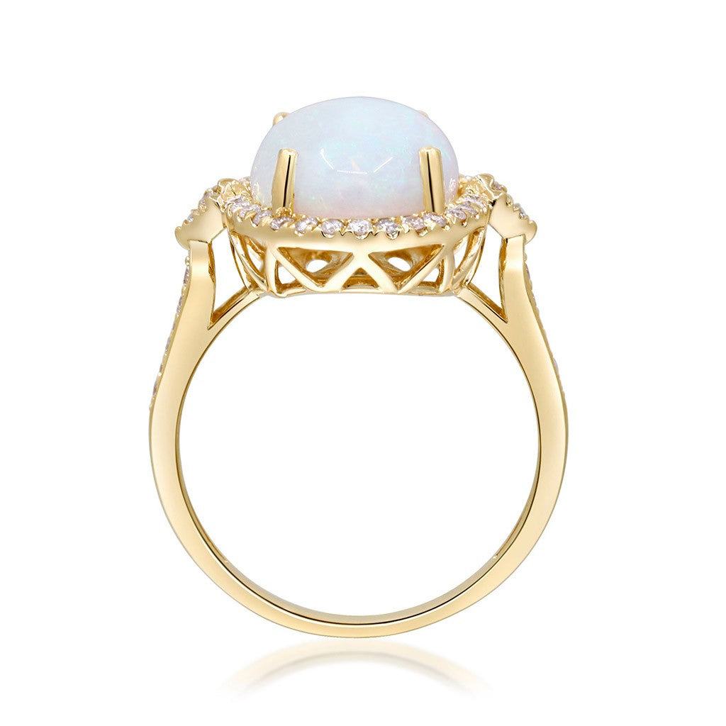 yellow gold opal and diamond halo ring with intricate undercarriage