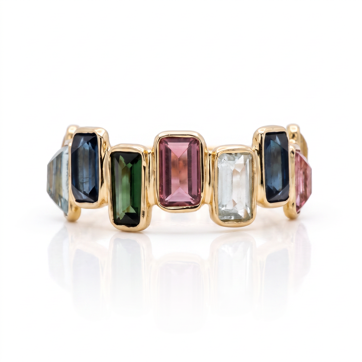 14K yellow gold multi-color tourmaline eternity band featuring 14 colorful natural tourmaline slices by Raymond Mazza.