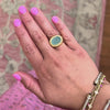 Oval bezel green chalcedony ring in yellow gold