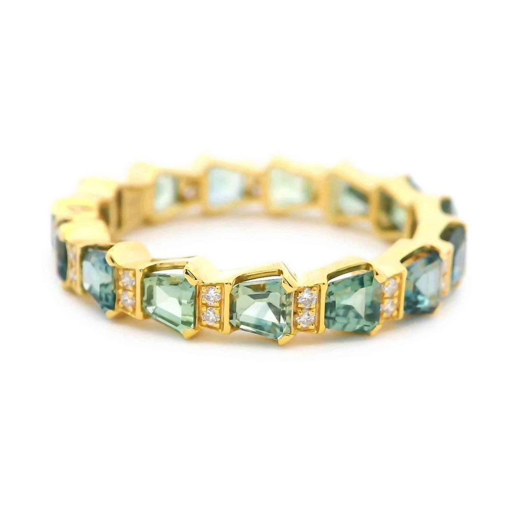 18K yellow gold band ring with trapezoid cut blue green sapphires and small diamond accents