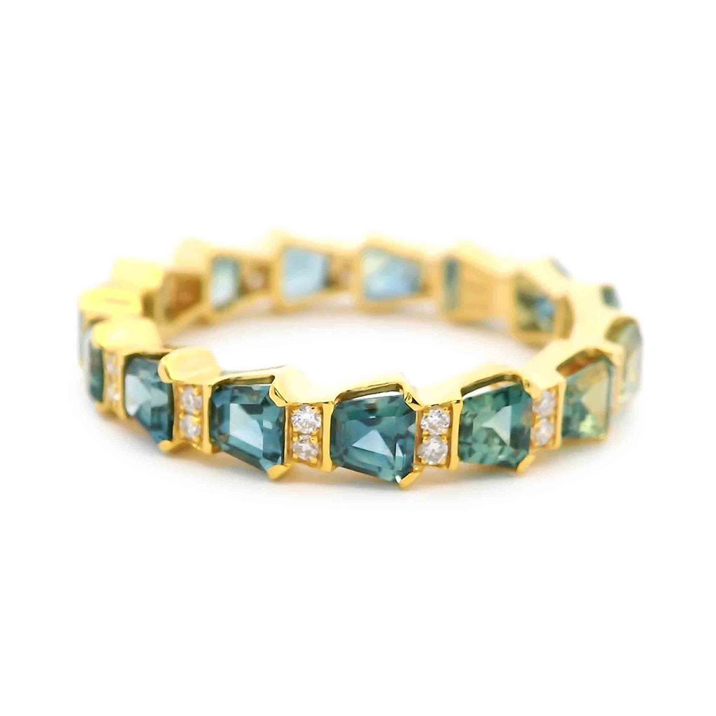 18K yellow gold band ring with trapezoid cut blue green sapphires and small diamond accents