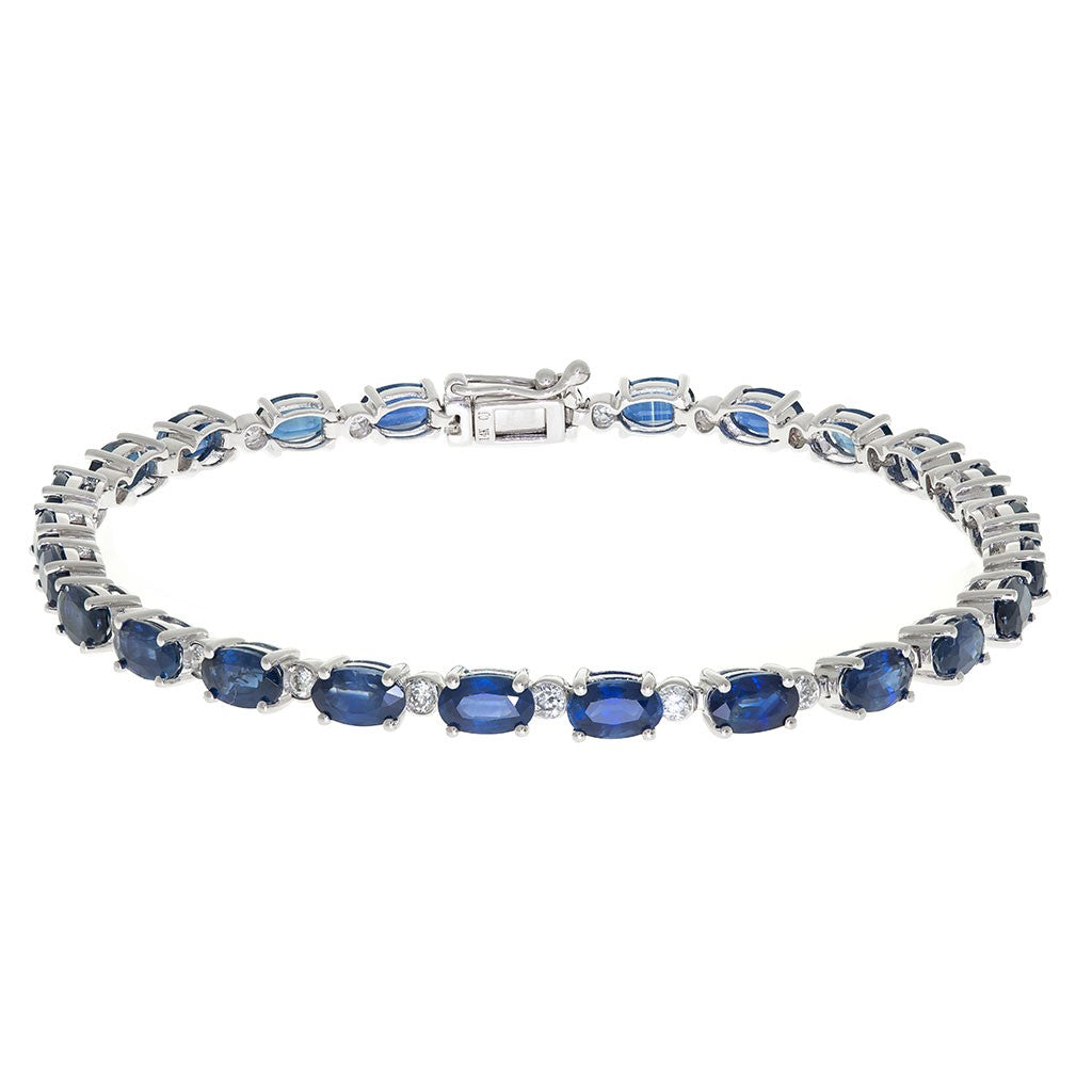 Alternating oval blue sapphire with round diamond bracelet in 14k white gold