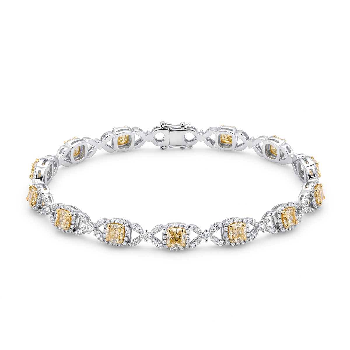 One-of-a-kind 8.06ctw yellow and white diamond bracelet in 18K white gold available at Victoria Jones Jewelry in Amarillo, Texas.