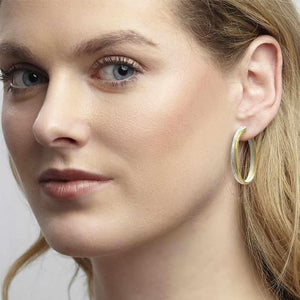 double hoop earrings in sterling silver and gold
