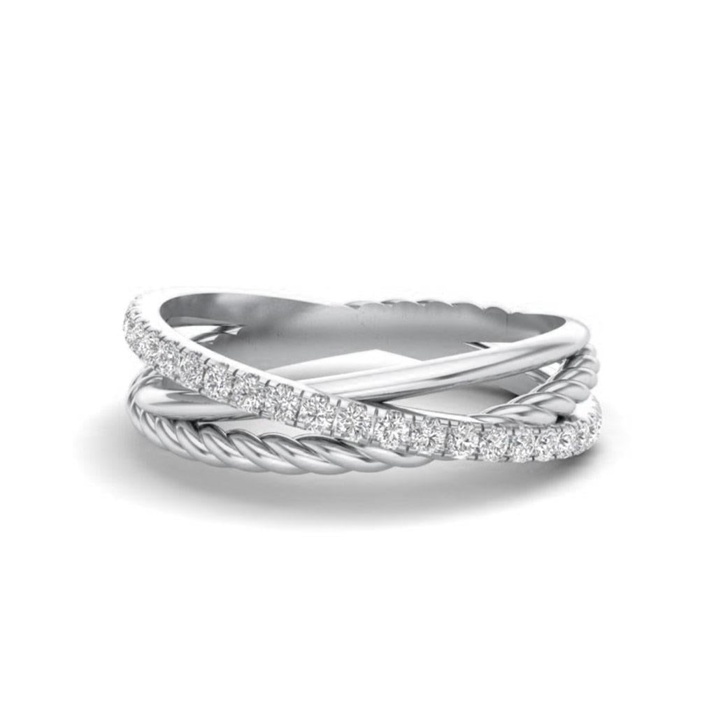 diamond cross over and twisted cable ring in white gold
