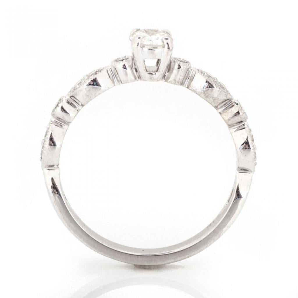 diamond white gold promise ring with milgrain details