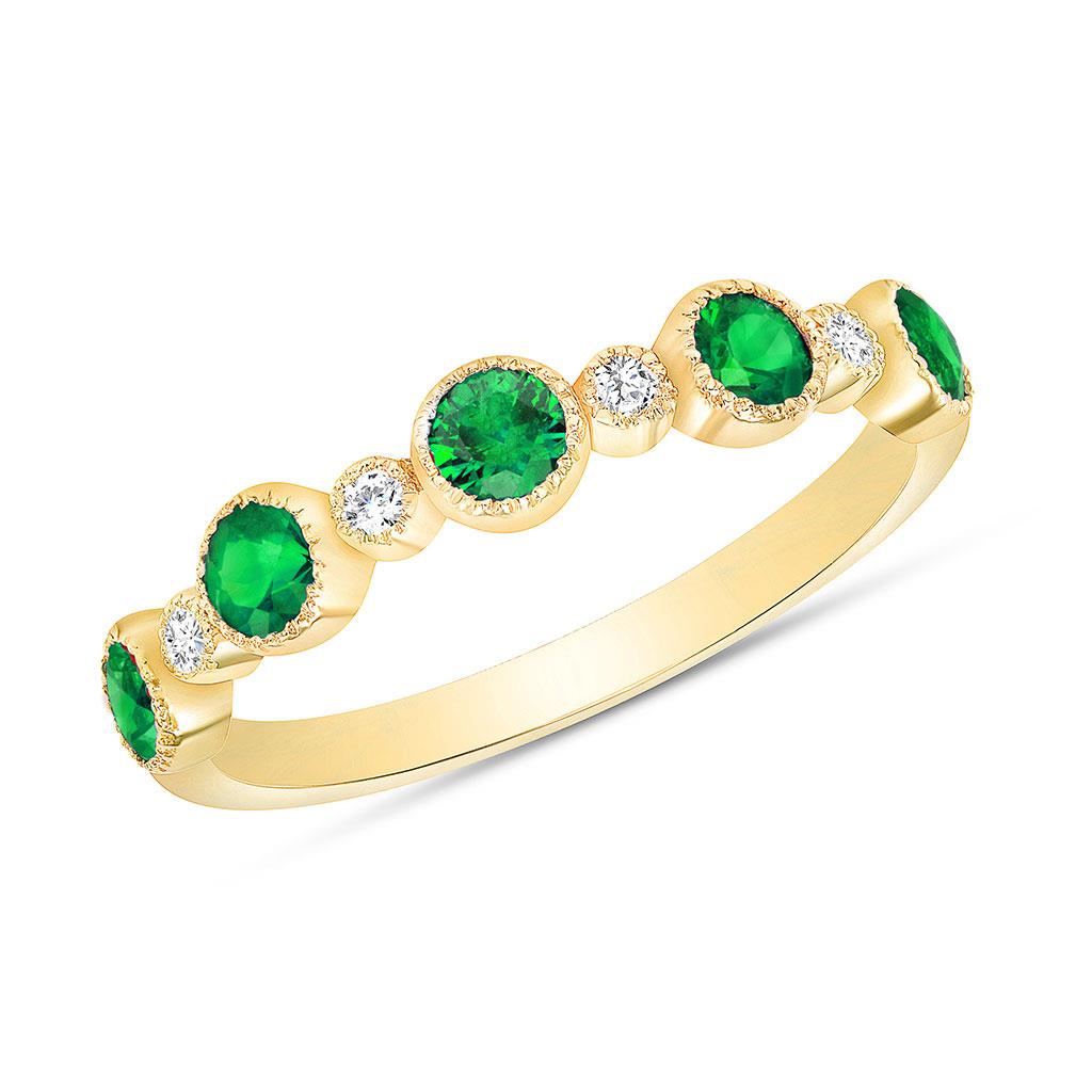 Emerald and diamond bezel set milgrain edge ring in yellow gold